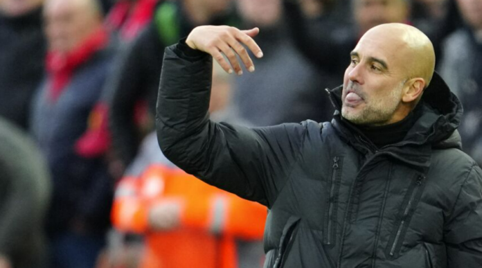 O Pep Guardiola στο Anfield.O Pep Guardiola στο Anfield.